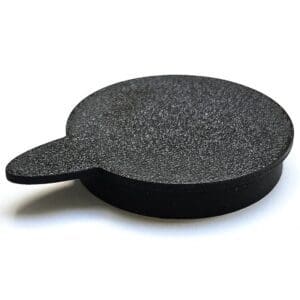 Round black stone plate with handle.