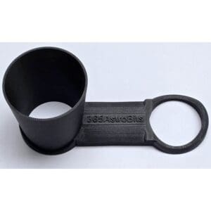 Black plastic holder with circular openings.